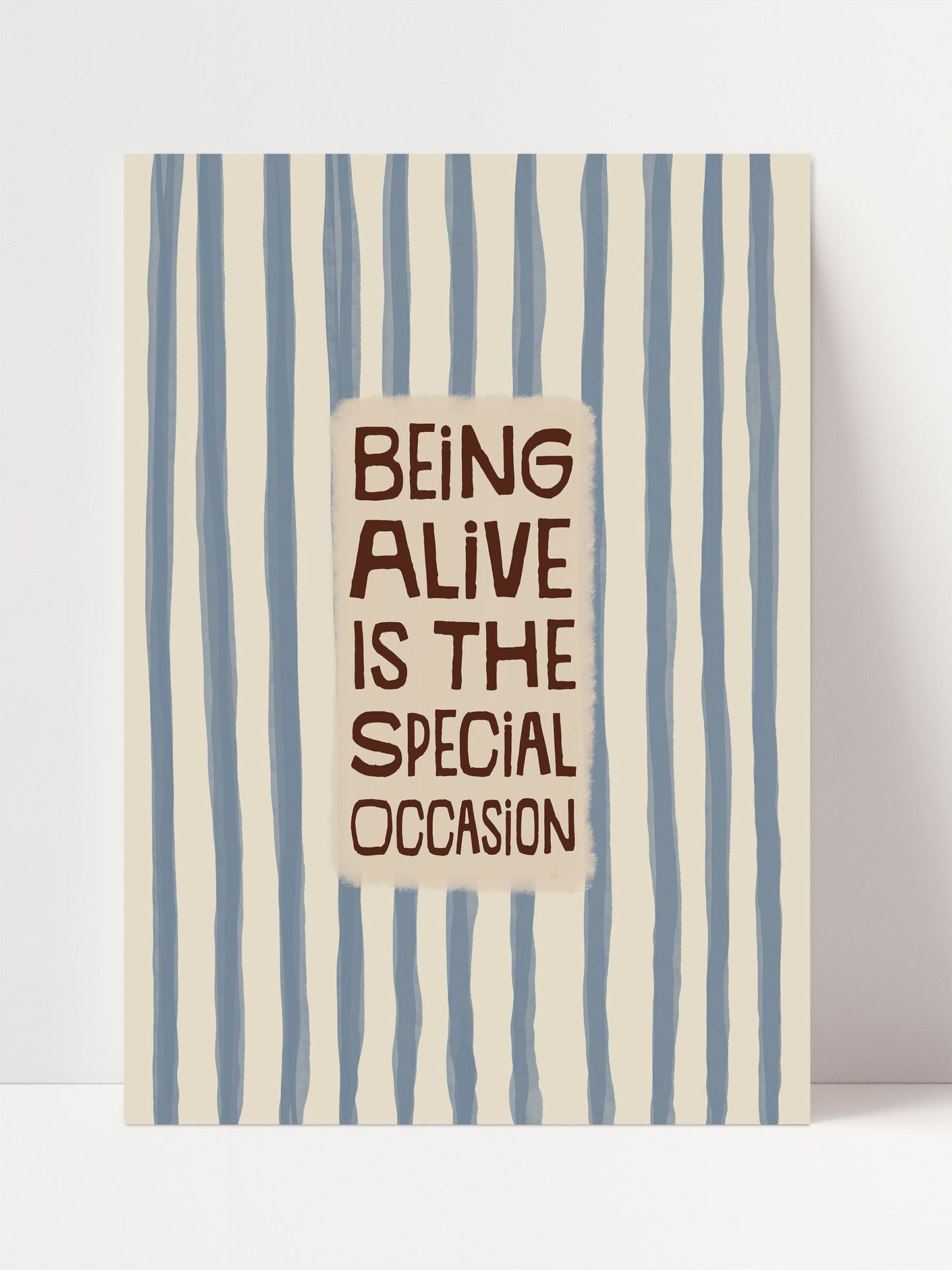 a bold statement that reads "Being alive is the special occasion" in a simple, sans-serif font.