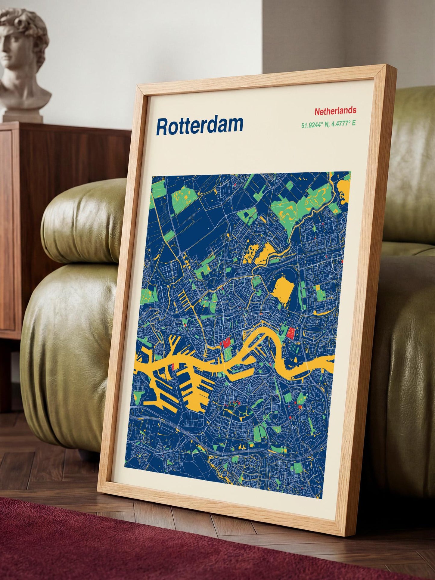 A framed map of Rotterdam, Netherlands, displaying a colorful and detailed map of the city.