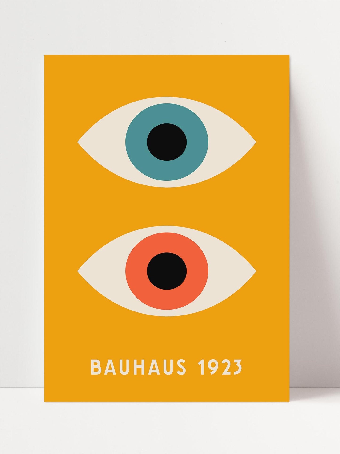 The image is a poster featuring a stylized illustration of two eyes, one blue and one orange, set against a bright yellow background. The text "BAHAU 23" is displayed below the illustration.