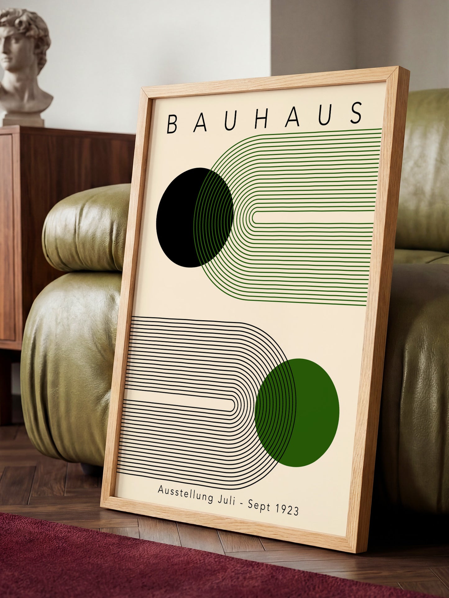 a framed poster of the Bauhaus art movement, with a minimalist design of geometric shapes and lines in shades of green and black.