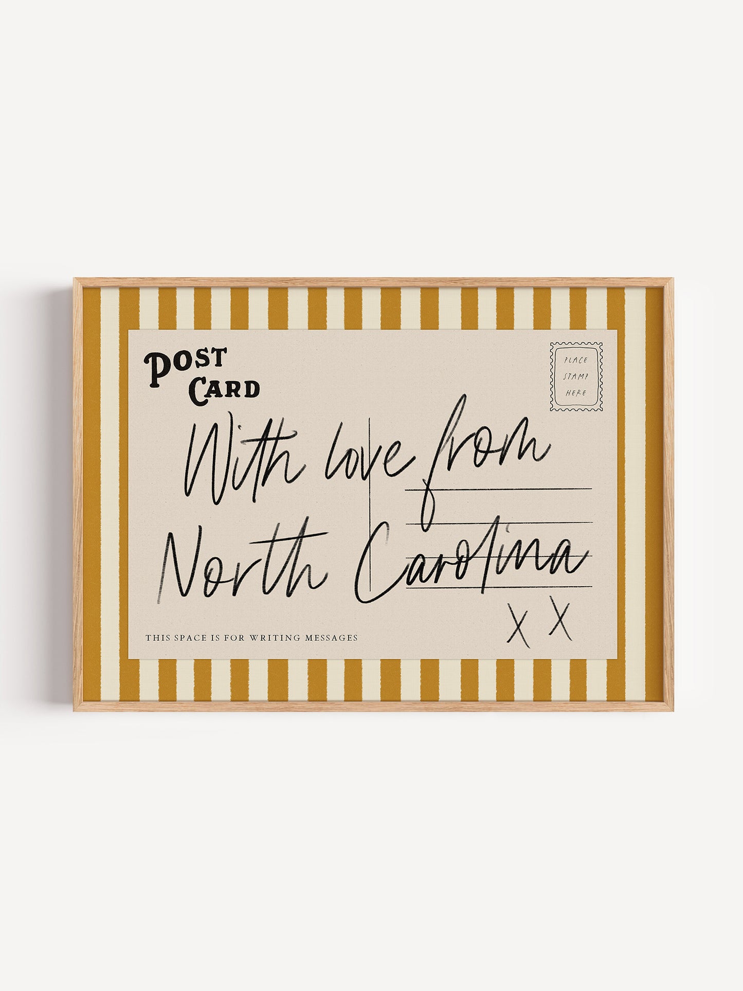 The image is a framed postcard with handwritten text that reads "With love from North Carolina" and "This space is for writing messages".