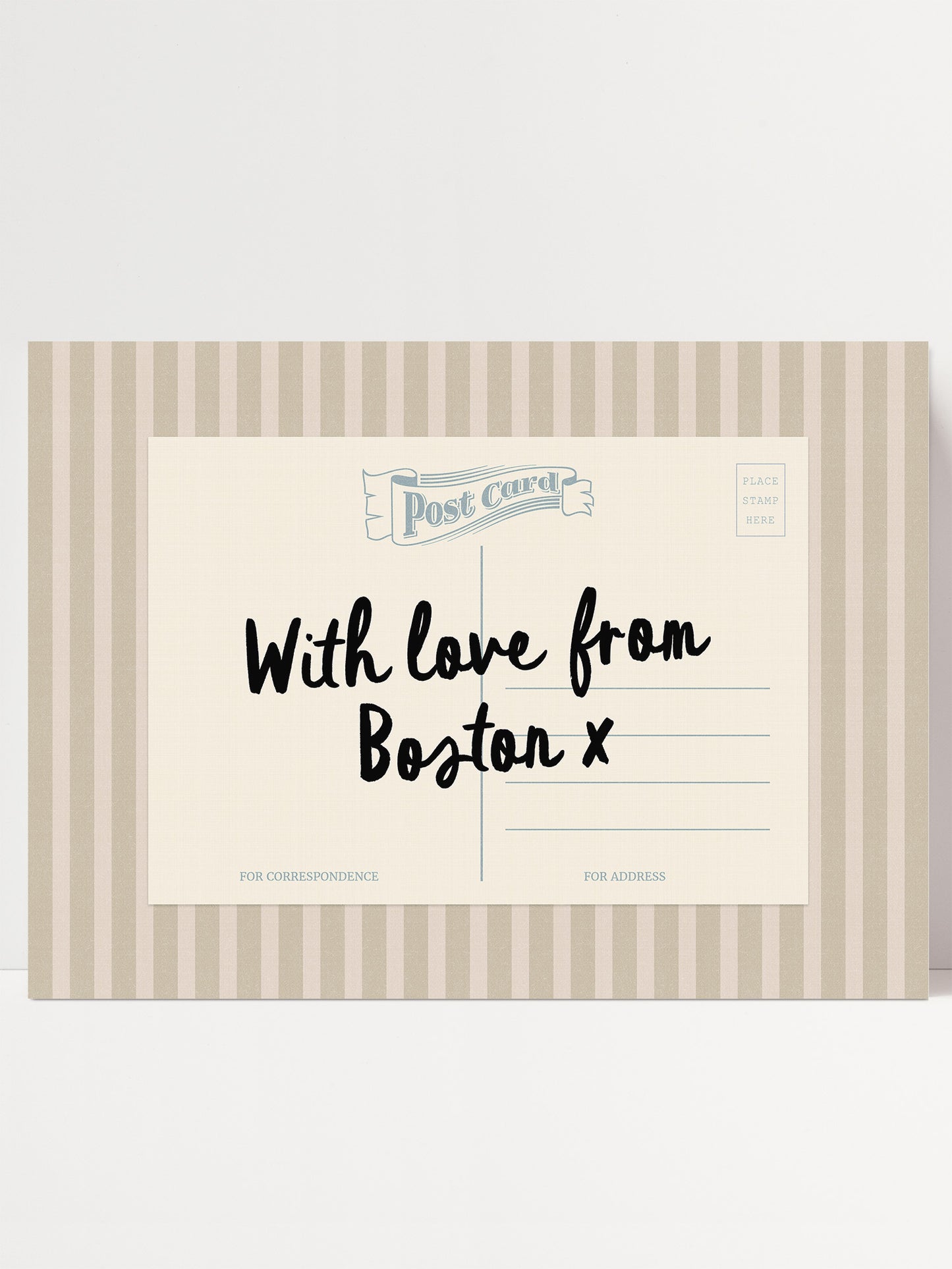 A postcard with a handwritten message that reads "With love from Boston x" and includes a blank space for a recipient's address.