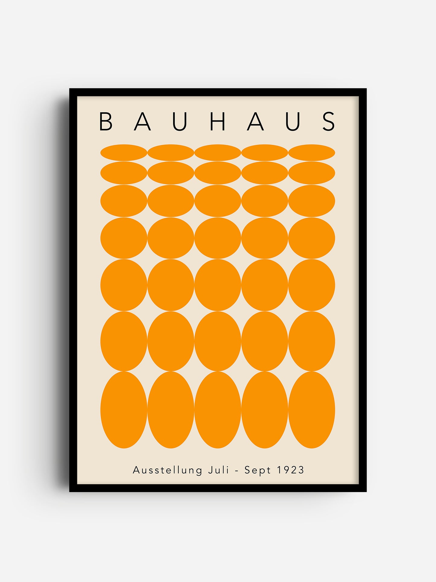 The image is a framed poster featuring a repeating pattern of orange circles on a beige background.