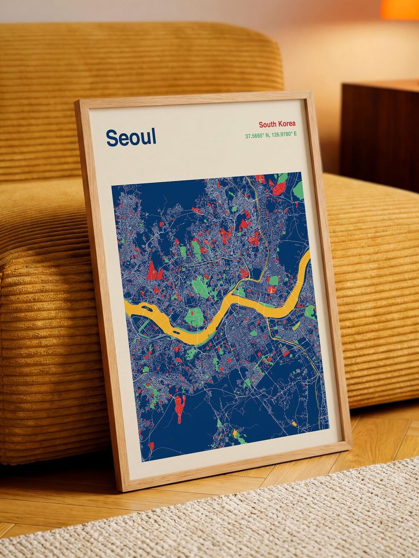 A framed map of Seoul, South Korea, with a colorful and detailed representation of the city's streets and landmarks.