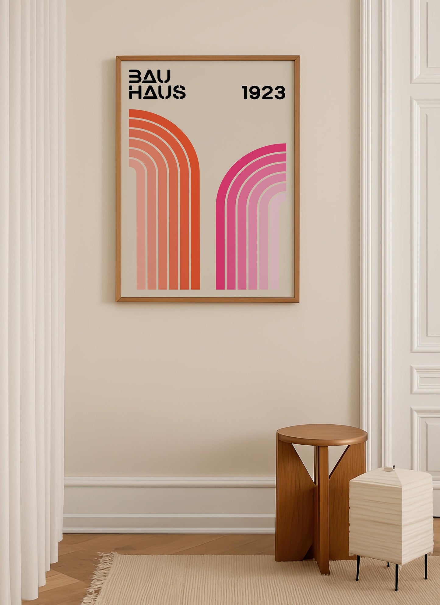 a framed poster of the Bauhaus design style, with a minimalist and modern aesthetic, hanging on a wall in a room with a wooden stool and a white lamp.