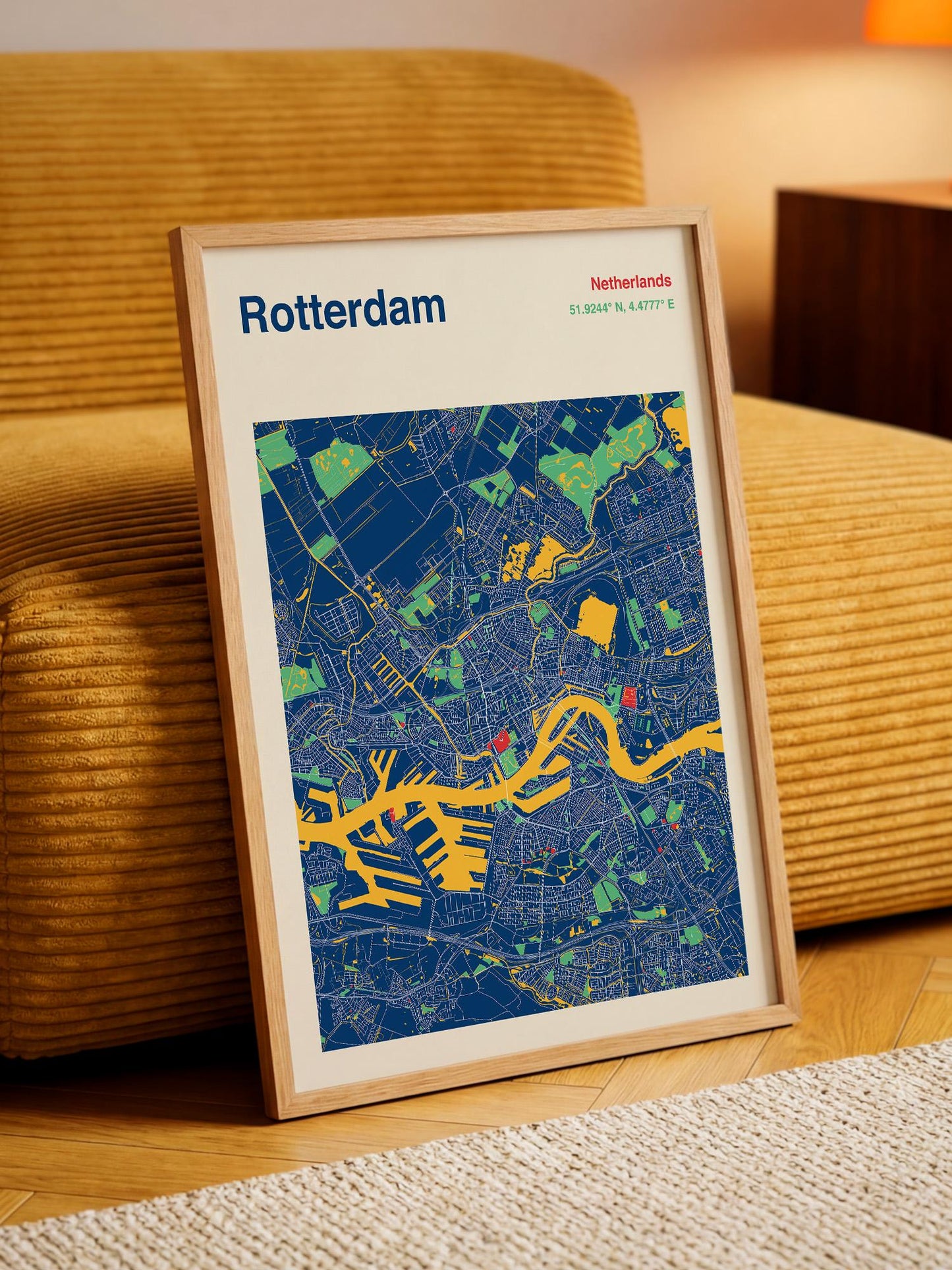 A framed map of Rotterdam, Netherlands, with a colorful and detailed representation of the city's streets and landmarks.