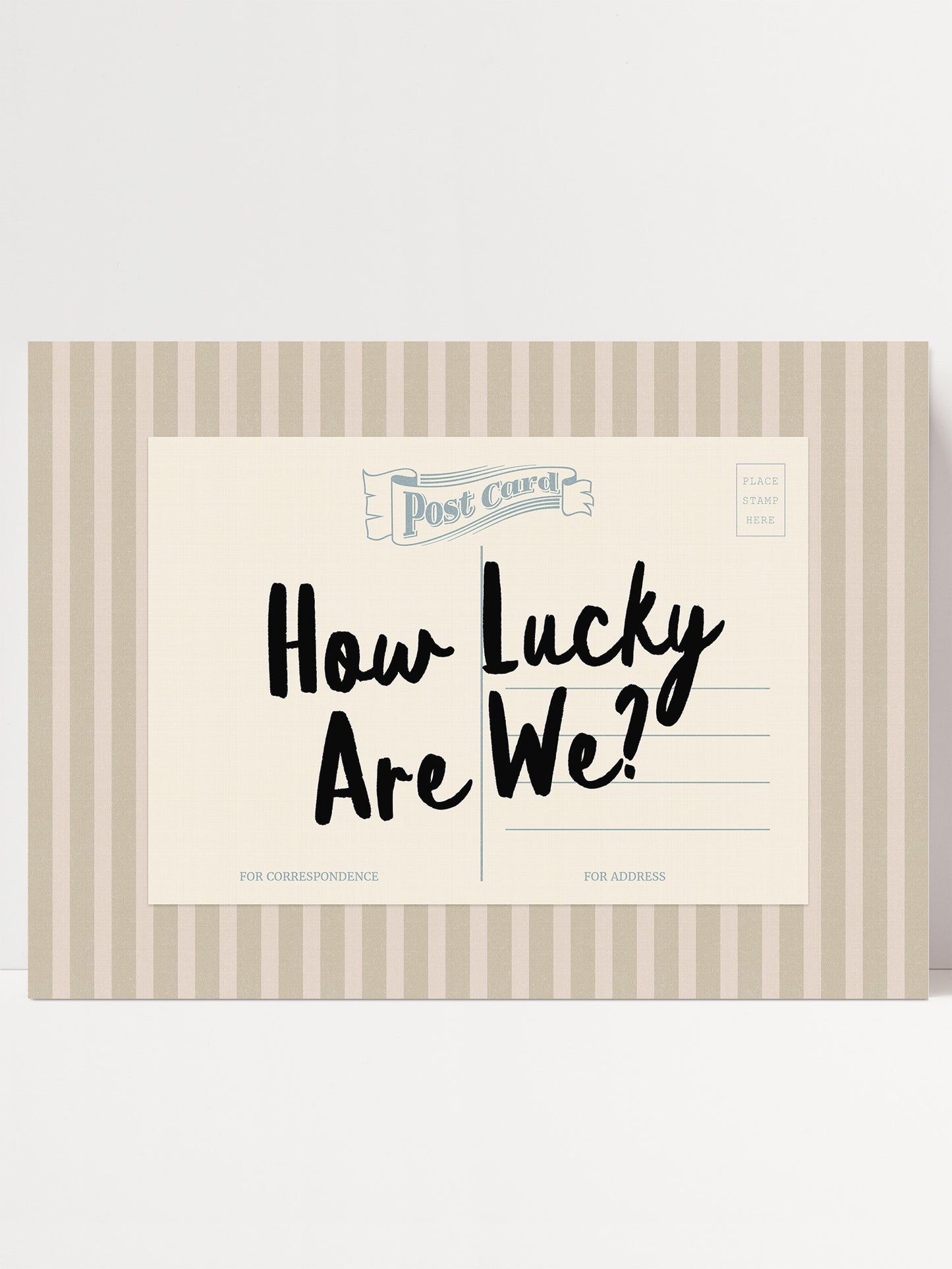 A postcard with the text "How Lucky Are We?" printed on it.