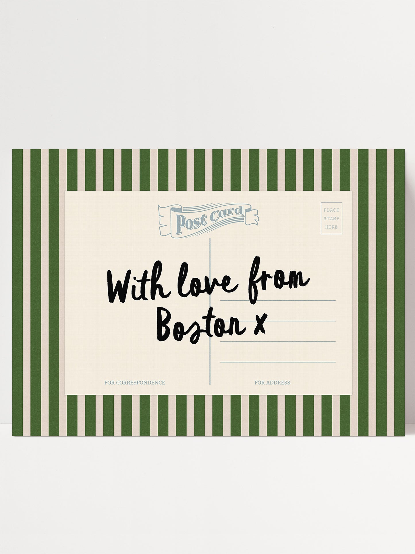 A postcard with a green and white striped border, featuring handwritten text that reads "With love from Boston x".