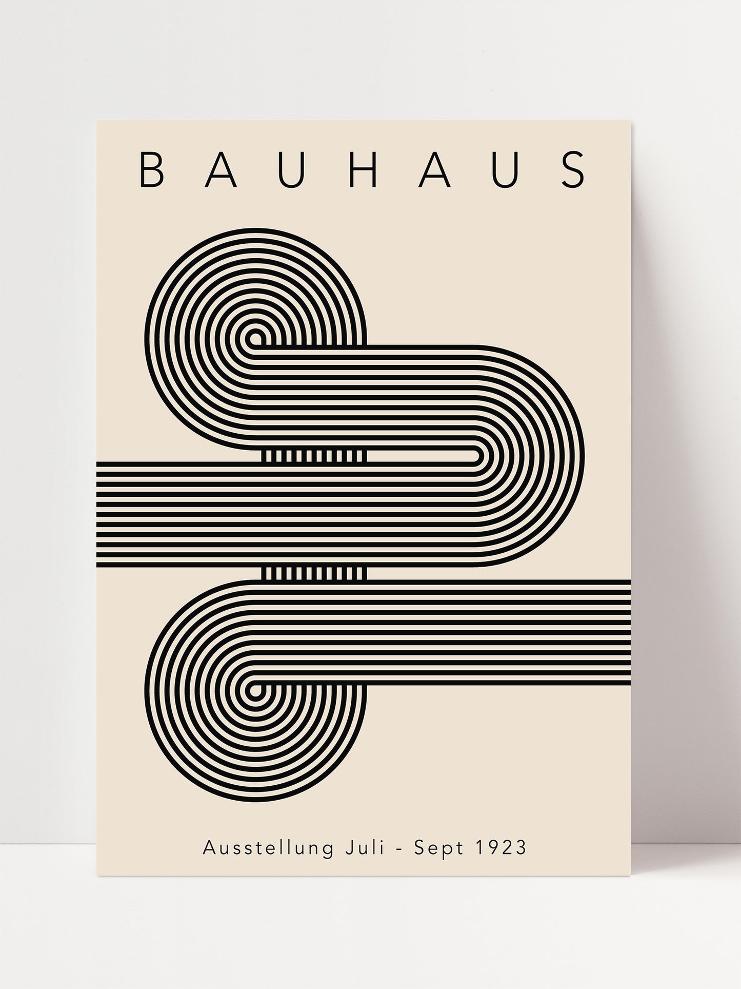 The image is a poster for the Bauhaus exhibition in 1923, featuring a minimalist design with a repeating pattern of black and white lines.