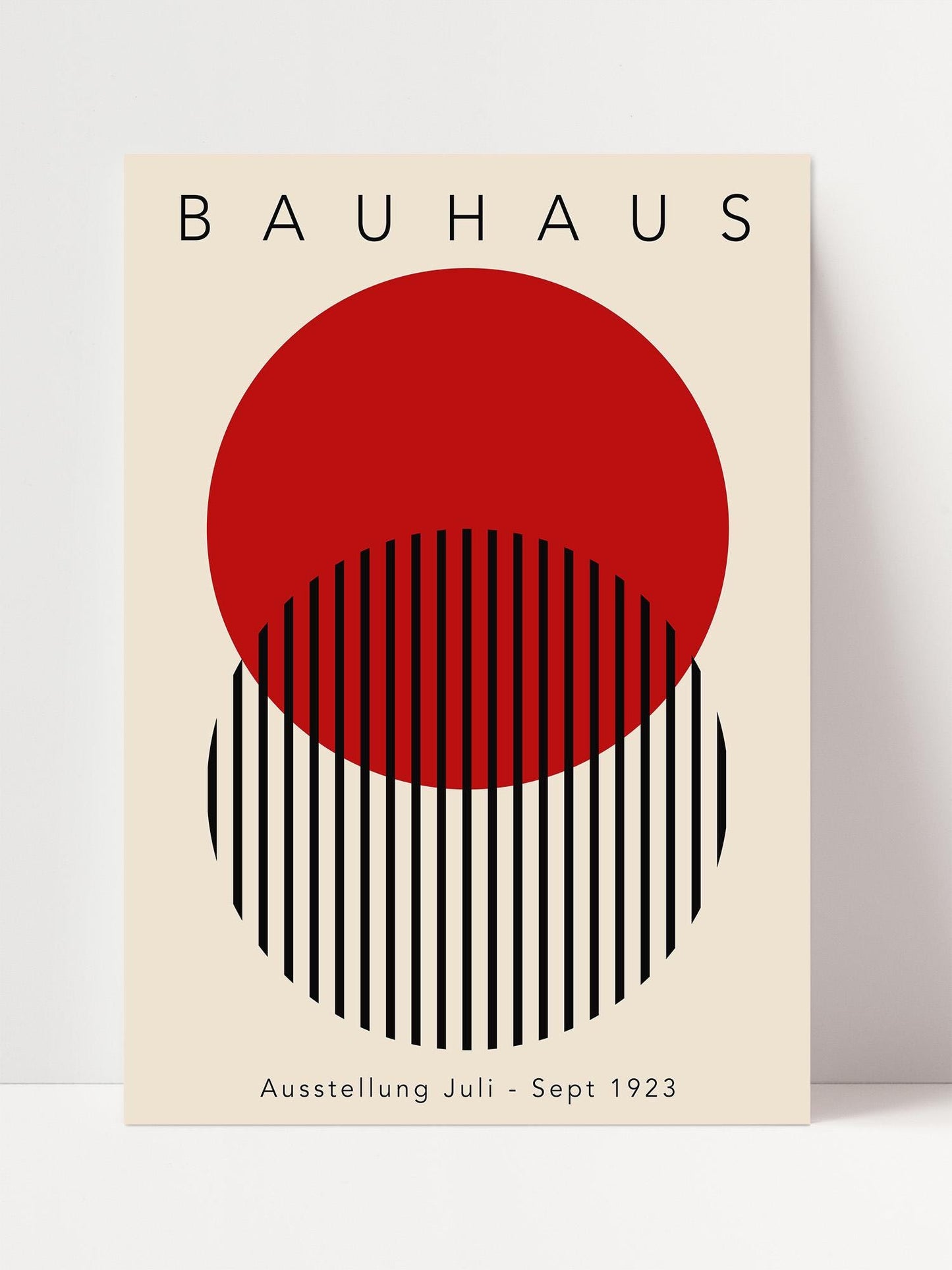 The image is a poster for the Bauhaus exhibition in 1923, featuring a bold red circle and black vertical lines.