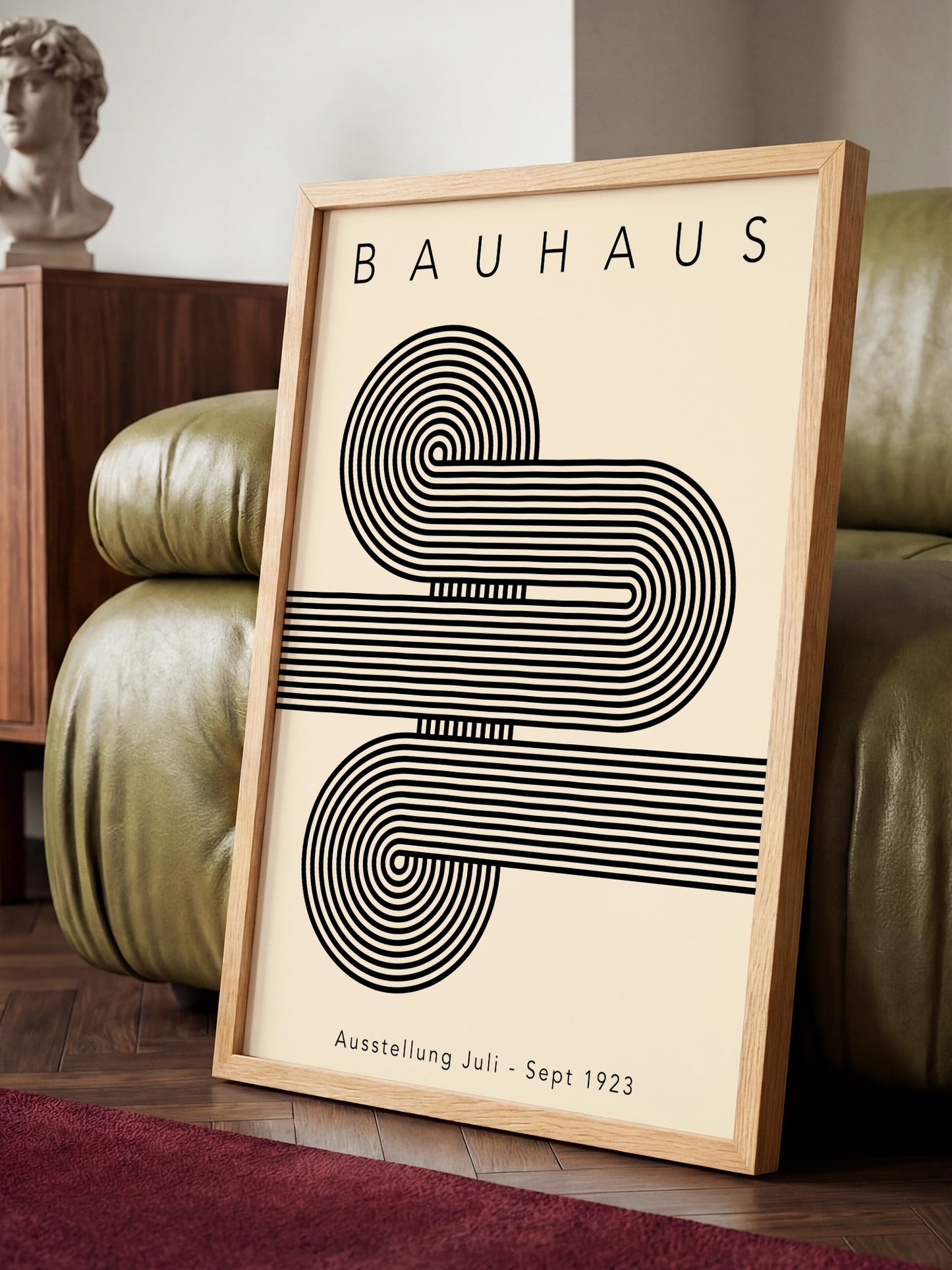 a framed poster of the Bauhaus art movement, with a minimalist design of black and white lines and swirls.
