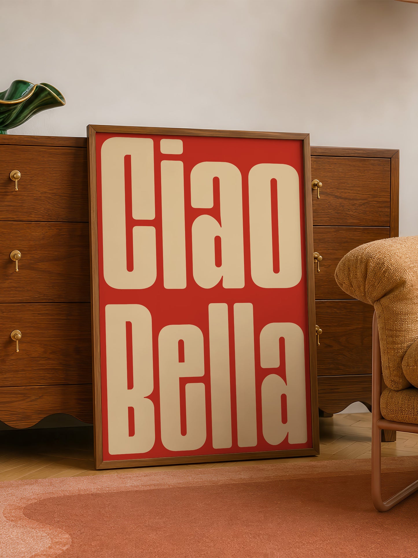 a large red sign with the word "Bella" written on it, placed in a room with a wooden dresser and a chair.