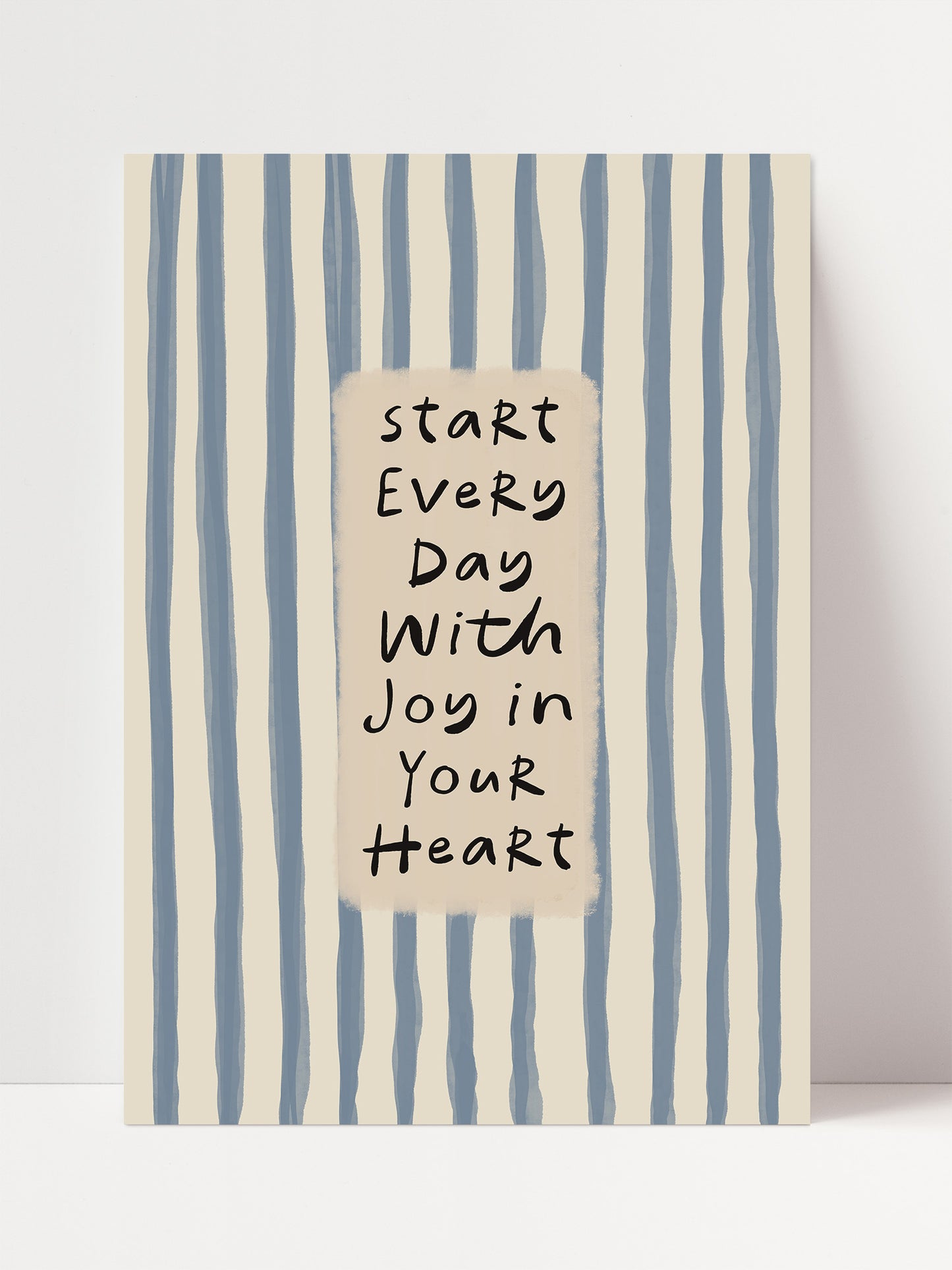 a motivational quote in black text against a striped background.