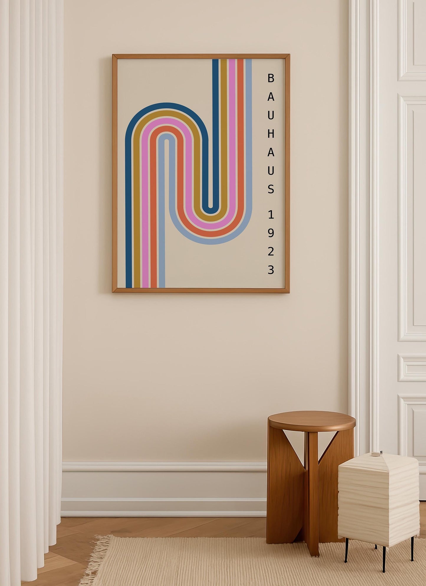 a minimalist interior design with a large abstract art piece hanging on the wall, a small wooden stool, and a white lamp.