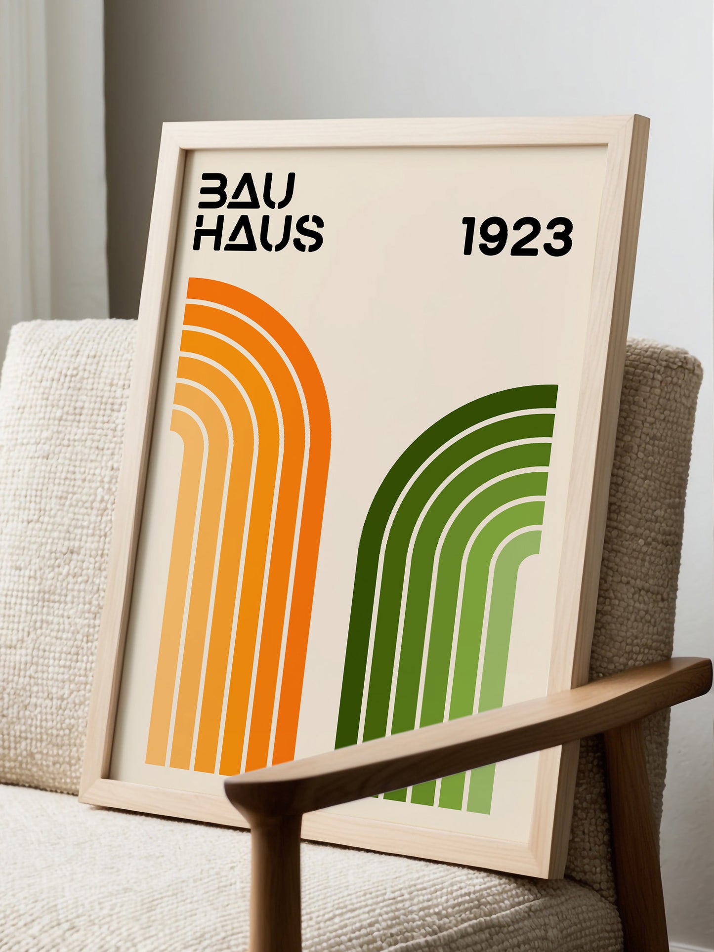 a framed poster with a minimalist design, displaying the text "BAU HAUS 1923" in bold black letters.