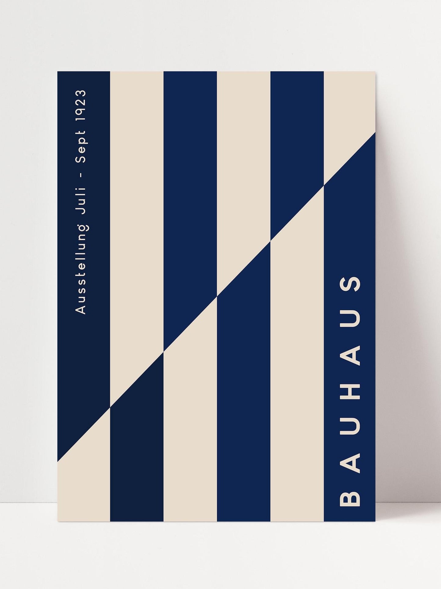 The image is a poster for the Bauhaus exhibition in 1933, featuring a geometric design with blue and beige vertical stripes.