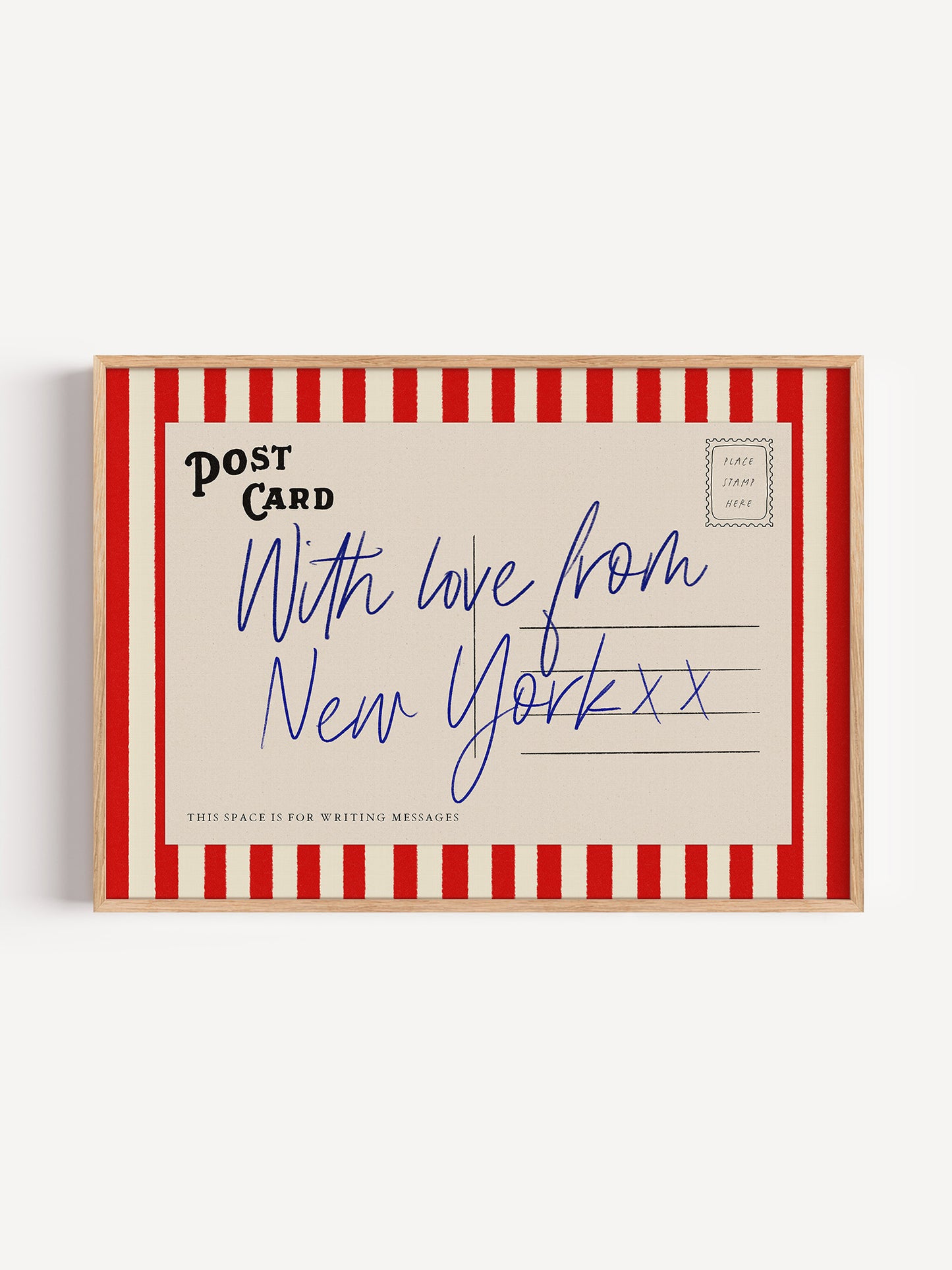 A framed postcard with a handwritten message that reads "With love from New York".