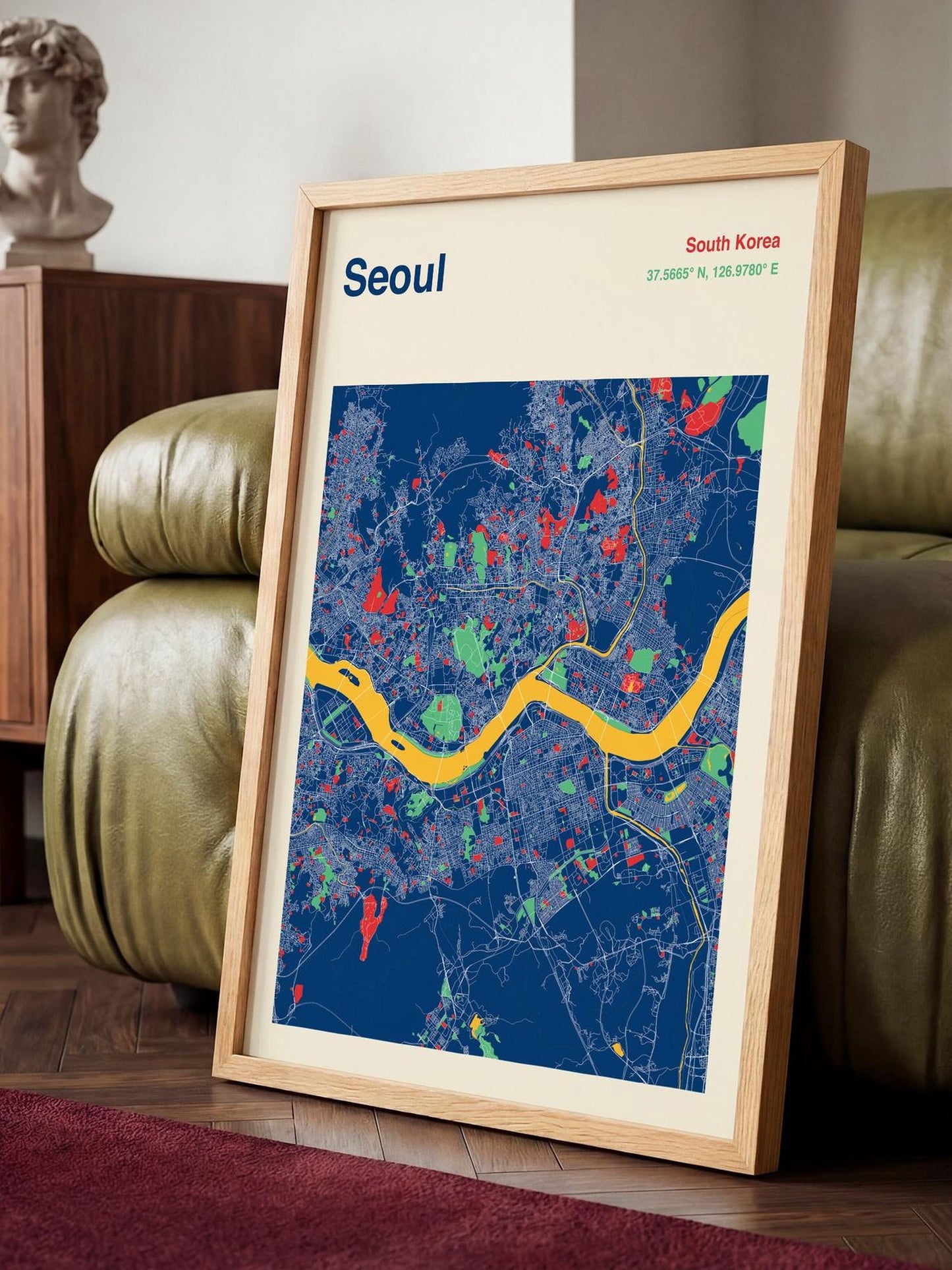 A framed map of Seoul, South Korea, with a colorful and detailed representation of the city's streets and landmarks.