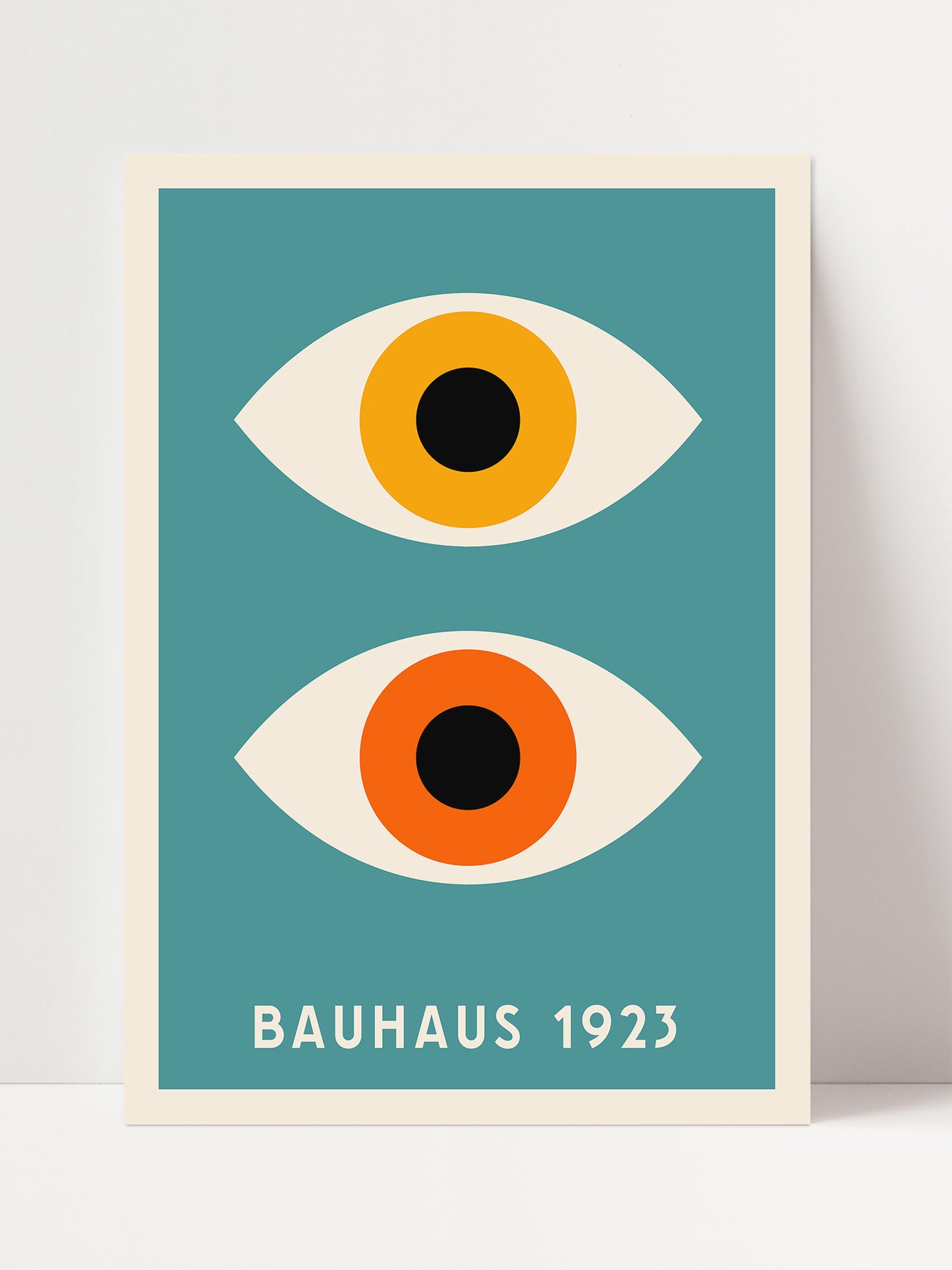 The image is a minimalist poster featuring a stylized representation of two eyes, one with a yellow iris and the other with an orange iris, set against a teal background.