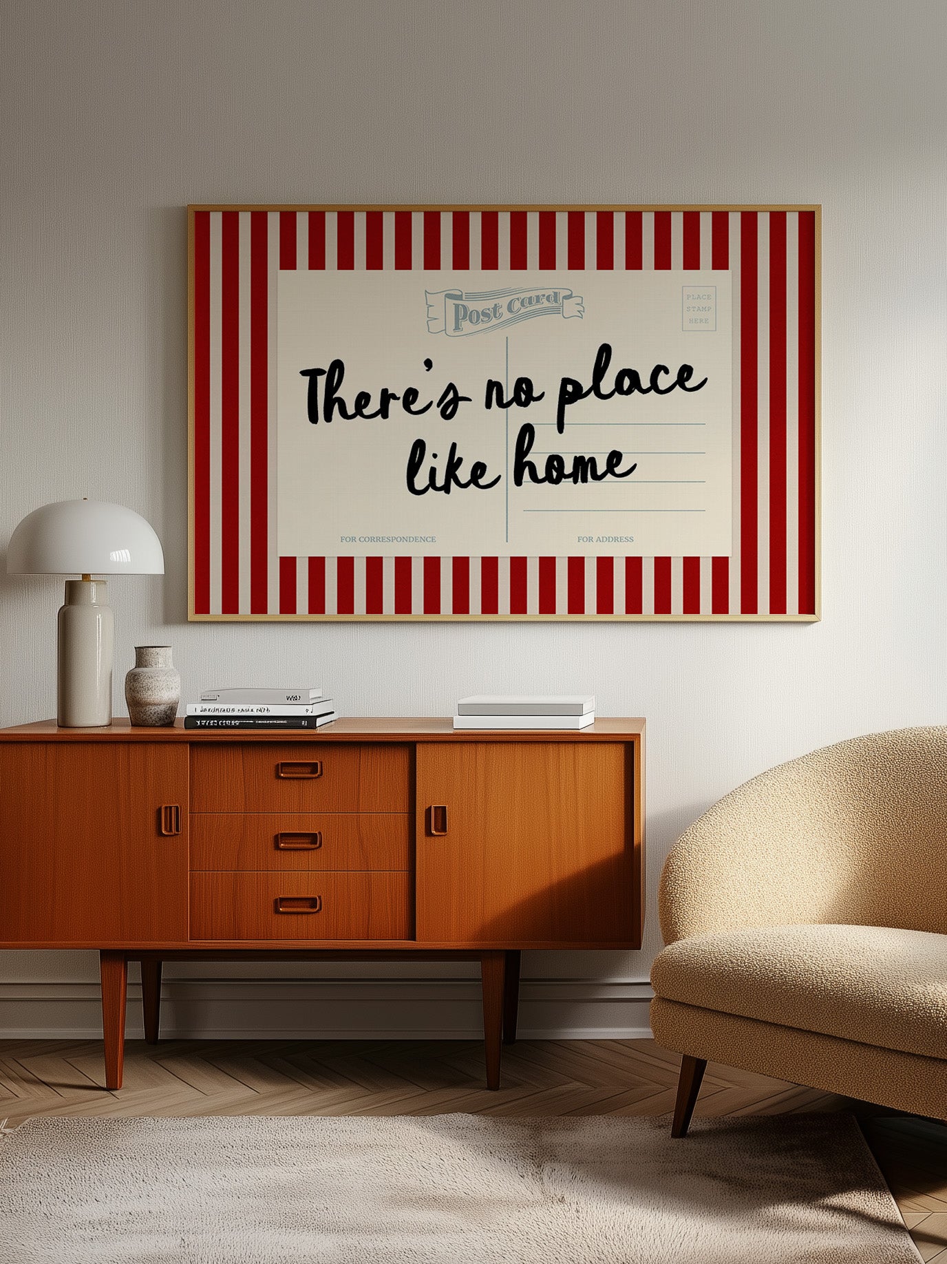 a vintage-style wooden cabinet with a red and white striped border, a lamp, a sofa, and a framed poster with the text "There's no place like home" on the wall.