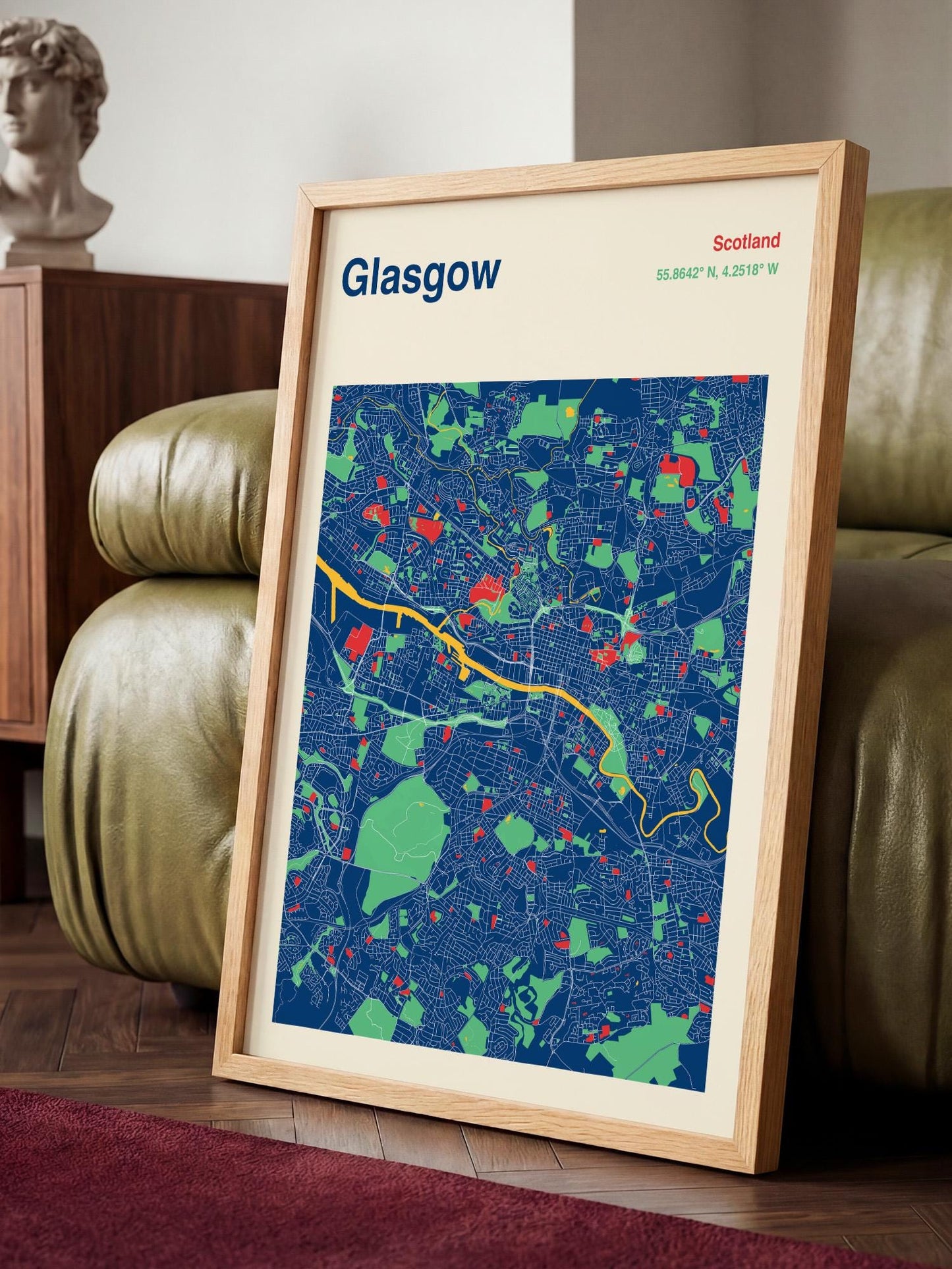 A framed map of Glasgow, Scotland, with a colorful and detailed representation of the city's streets and landmarks.