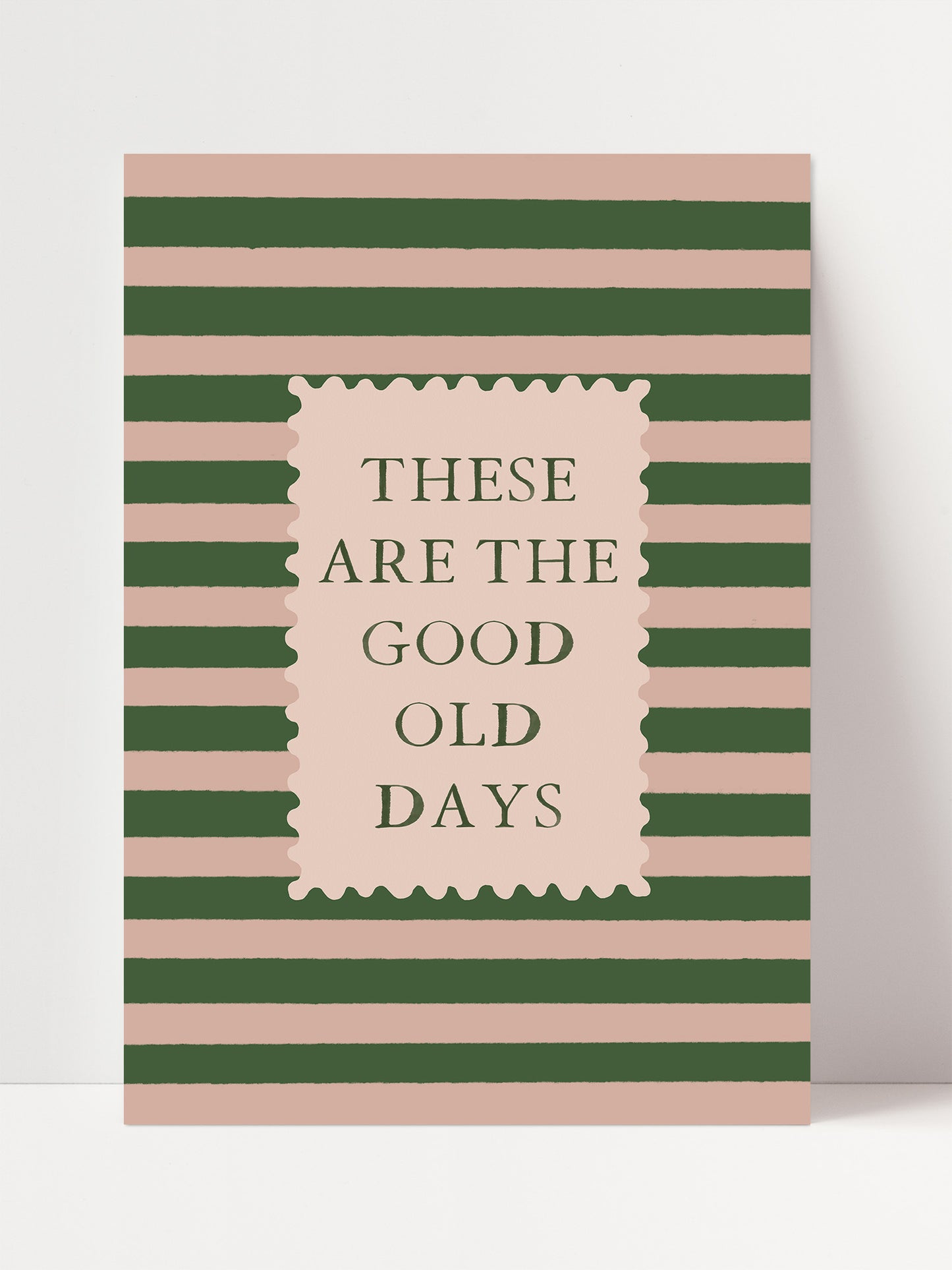 The image is a poster with a striped background and a rectangular frame containing the text "These are the good old days".