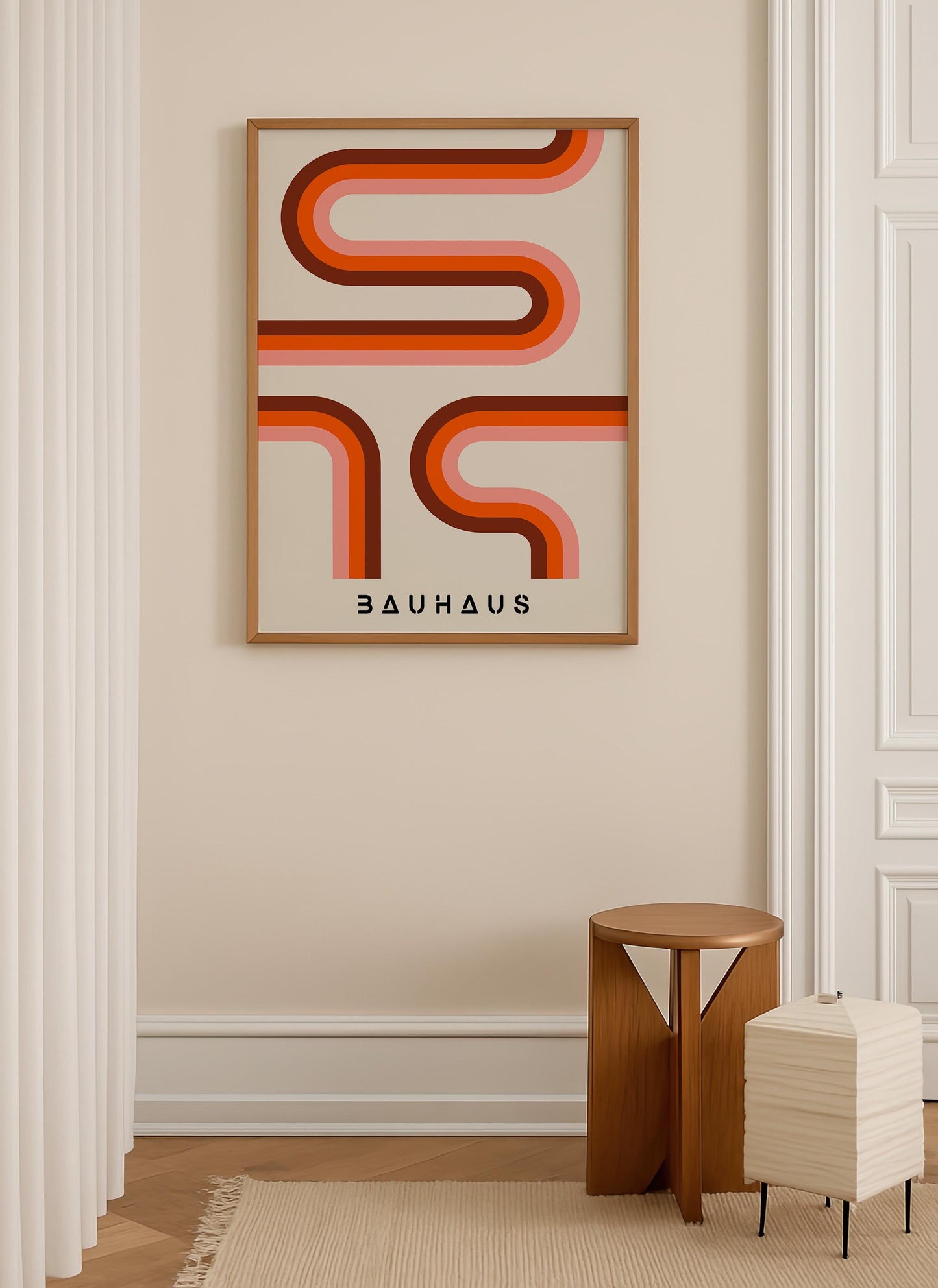 a minimalist interior design with a framed abstract art piece hanging on the wall, a small wooden stool, and a white lamp.
