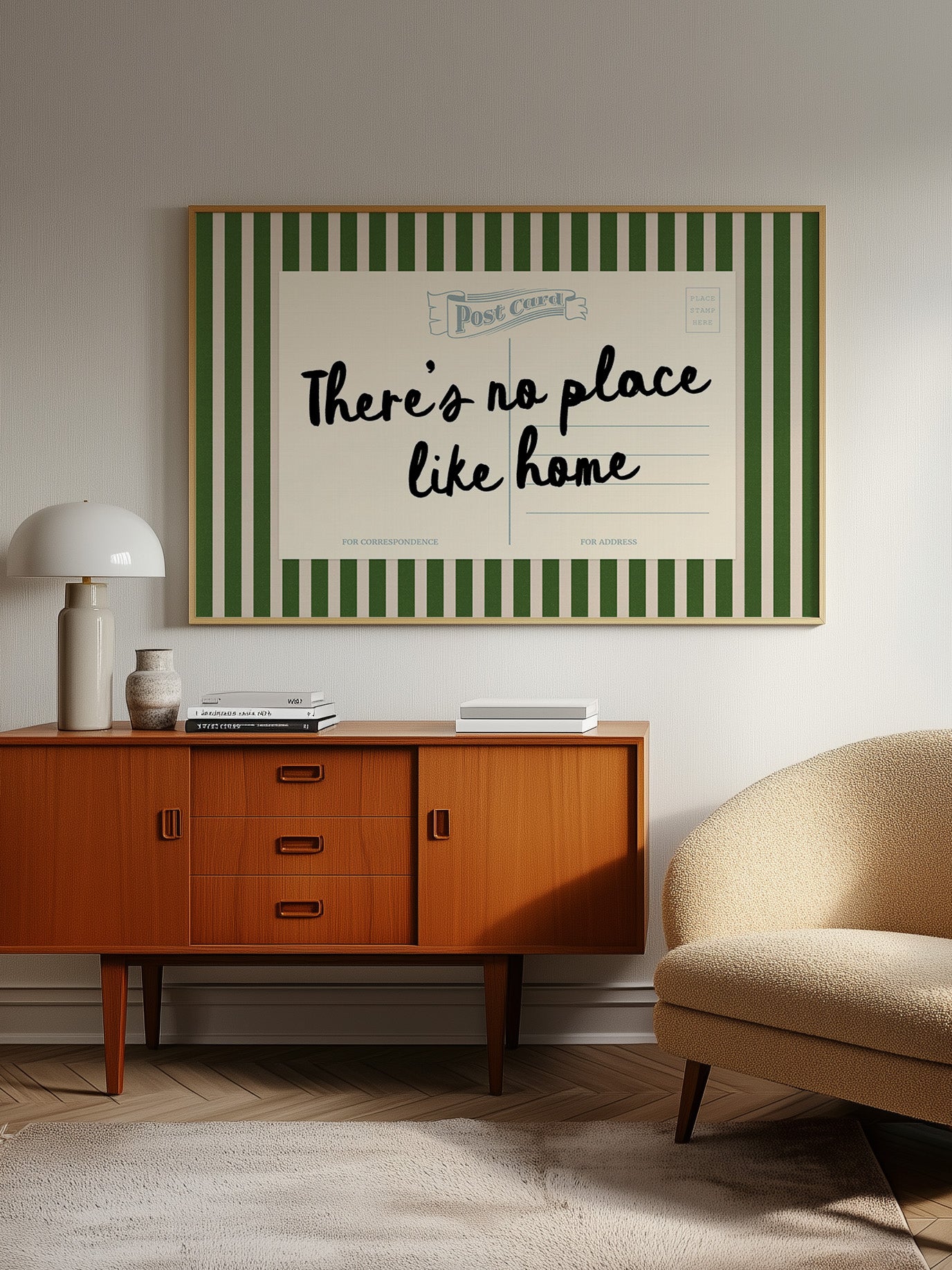 a vintage-style wooden cabinet with a green and white striped border, a lamp, a sofa, and a framed poster with the text "There's no place like home" on the wall.