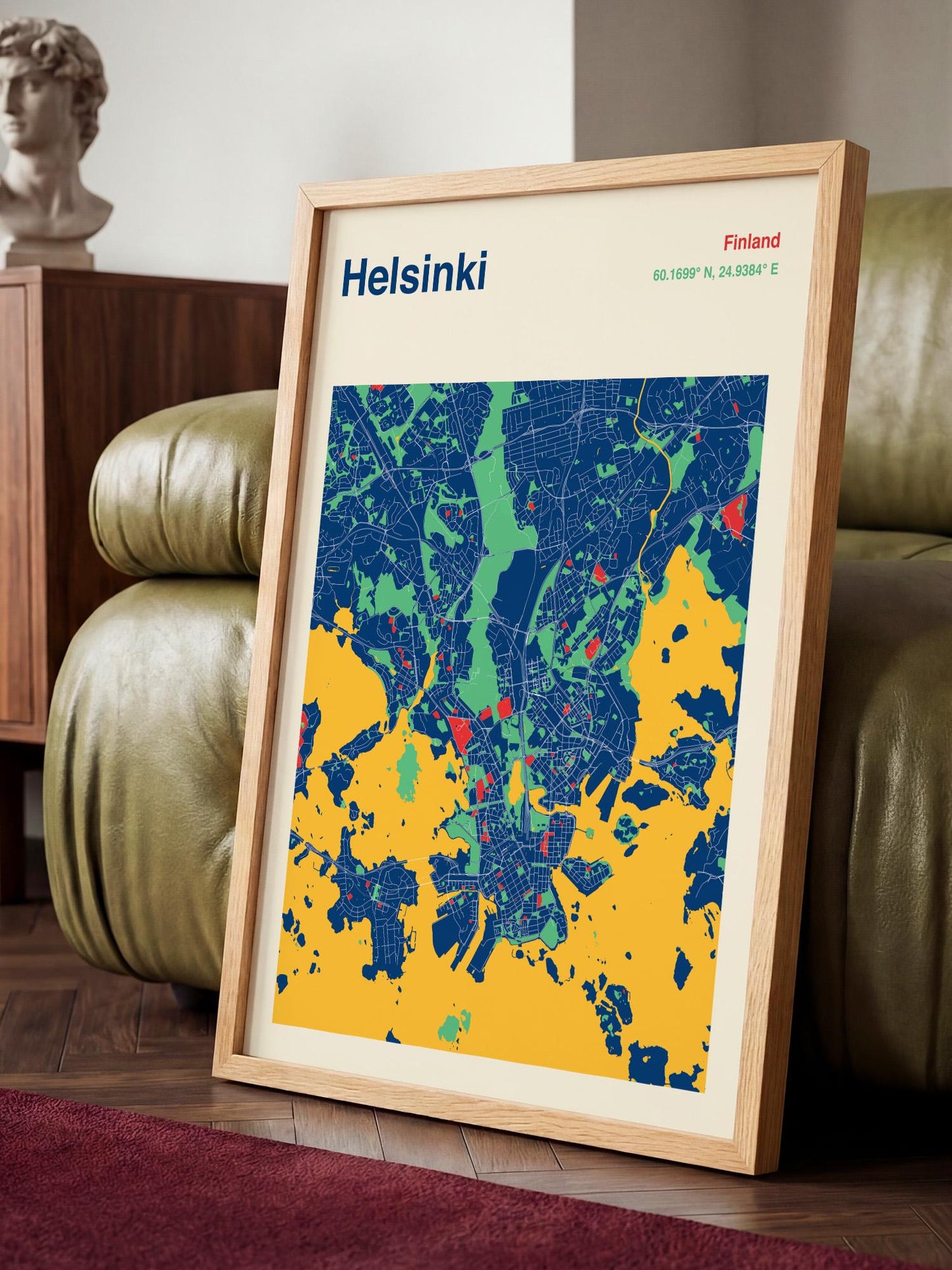A framed map of Helsinki, Finland, with a colorful and detailed representation of the city's streets and landmarks.