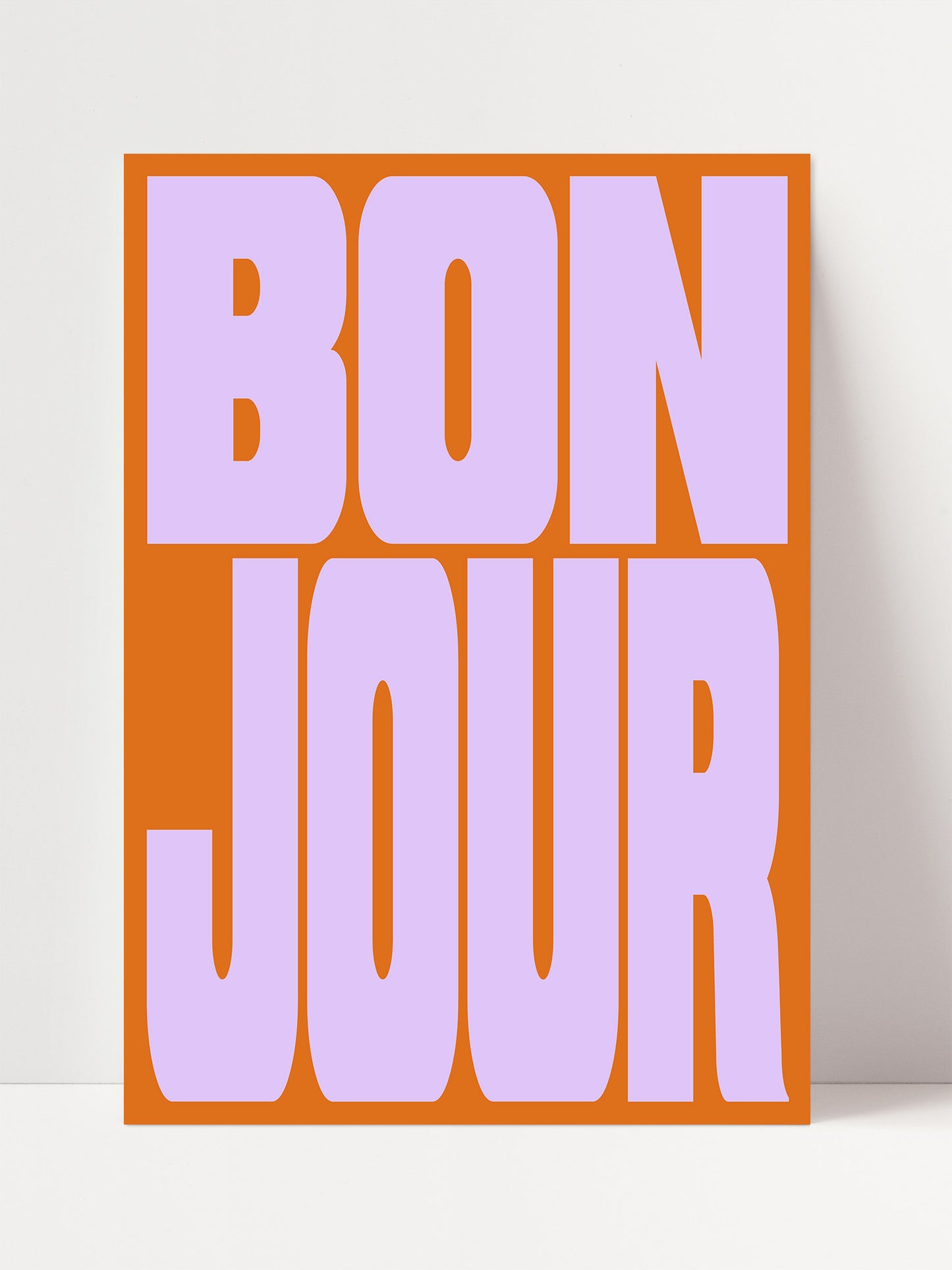 a large, bold, and colorful text that reads " bon jour".