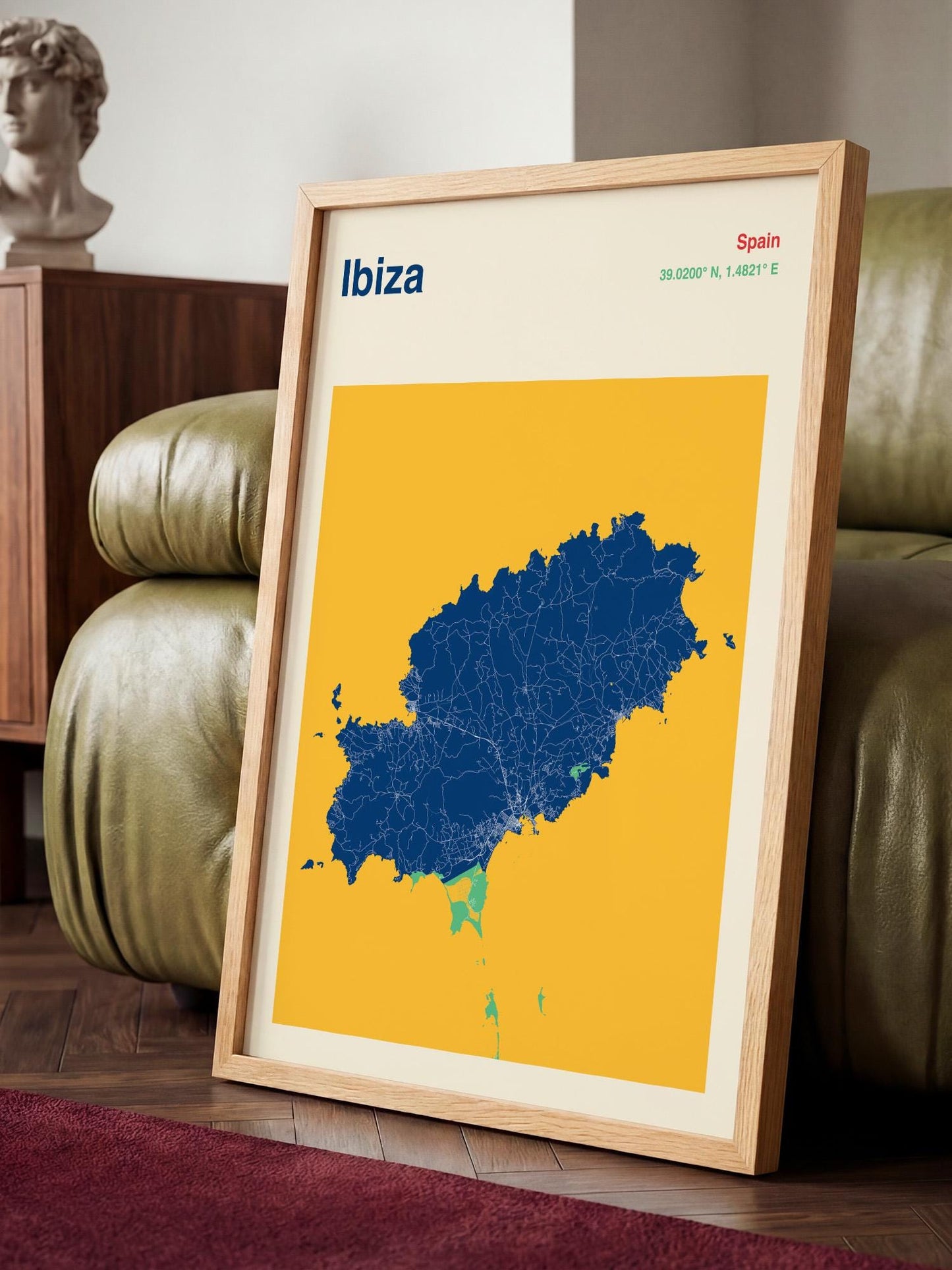 a framed map of Ibiza, Spain, with a yellow background and a blue outline of the island.