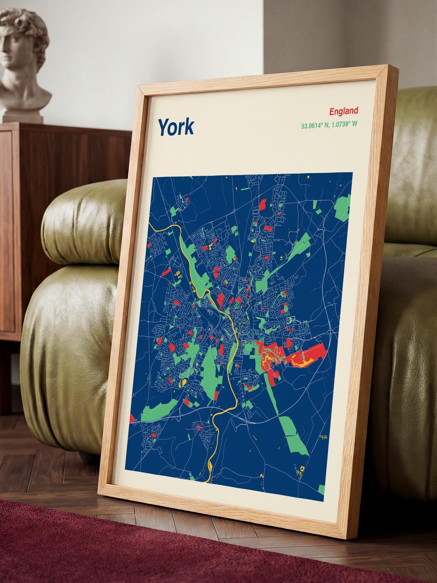 A framed map of York, England, with a colorful and detailed representation of the city's streets and landmarks.