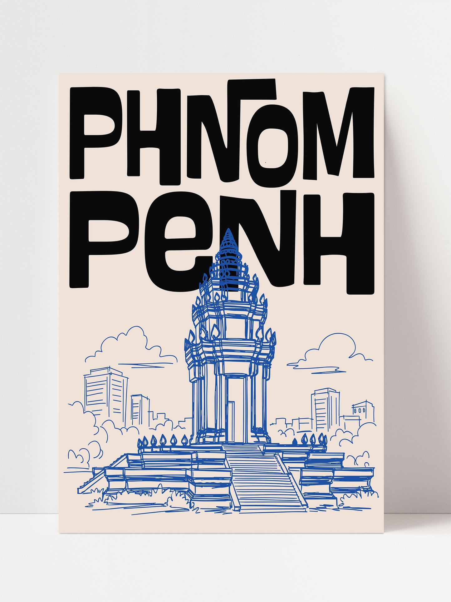 a large blue and white temple with a tall spire, surrounded by a cityscape.