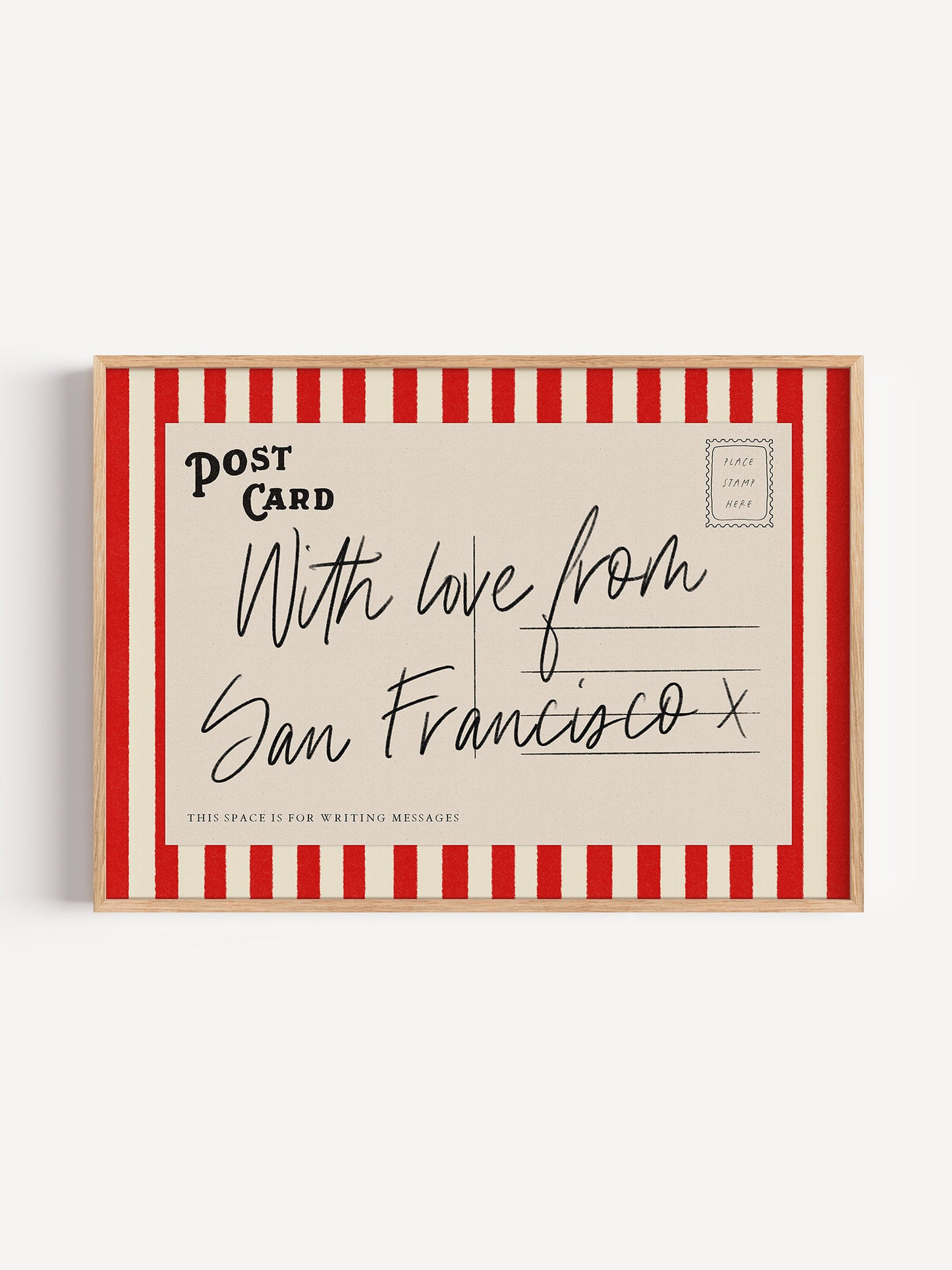 A framed postcard with a handwritten message that reads "With love from San Francisco x" and "This space is for writing messages".