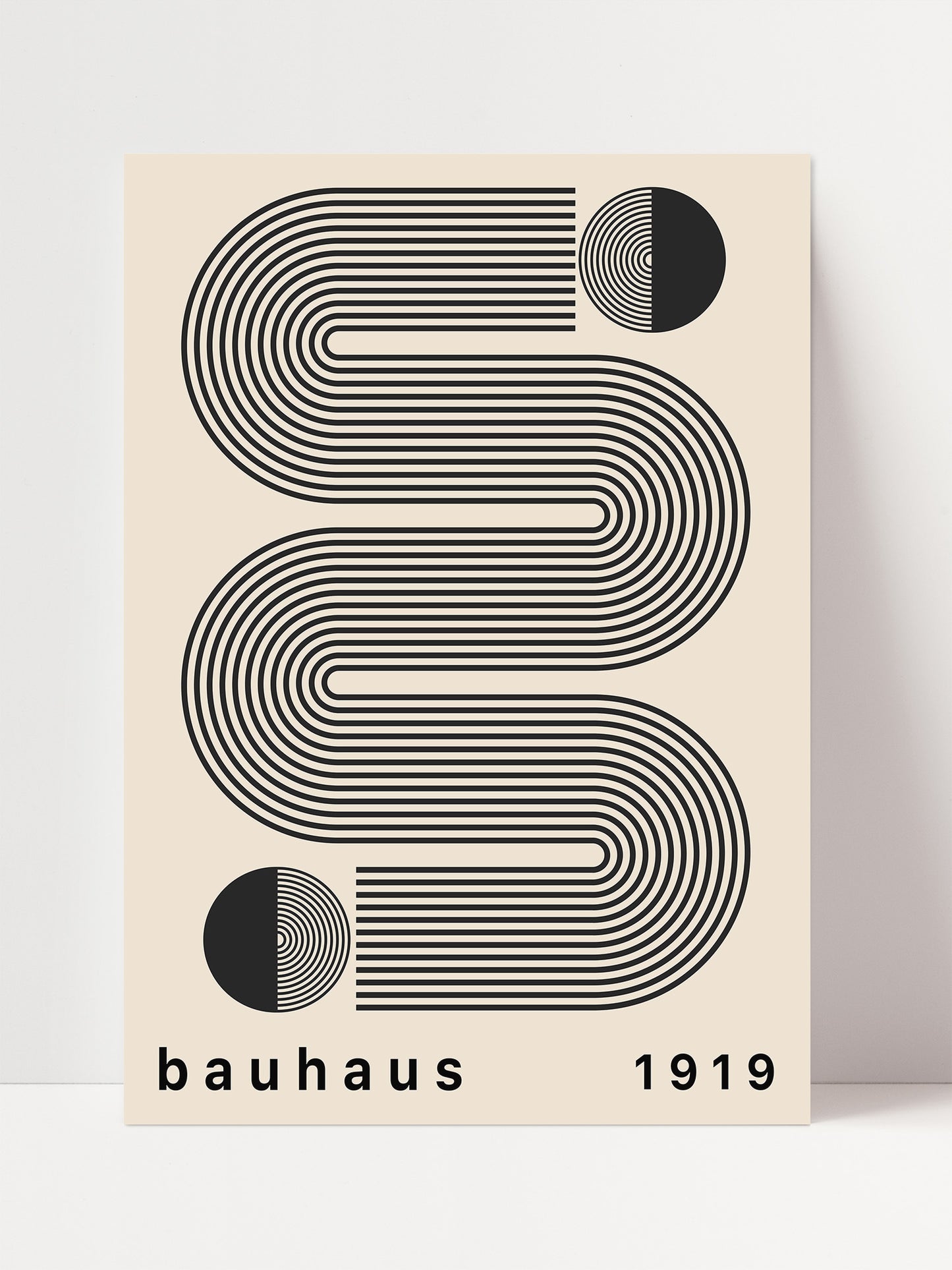 The image is a minimalist poster featuring a repeating geometric pattern in black and white, with the text "bauhaus 1919" below it.