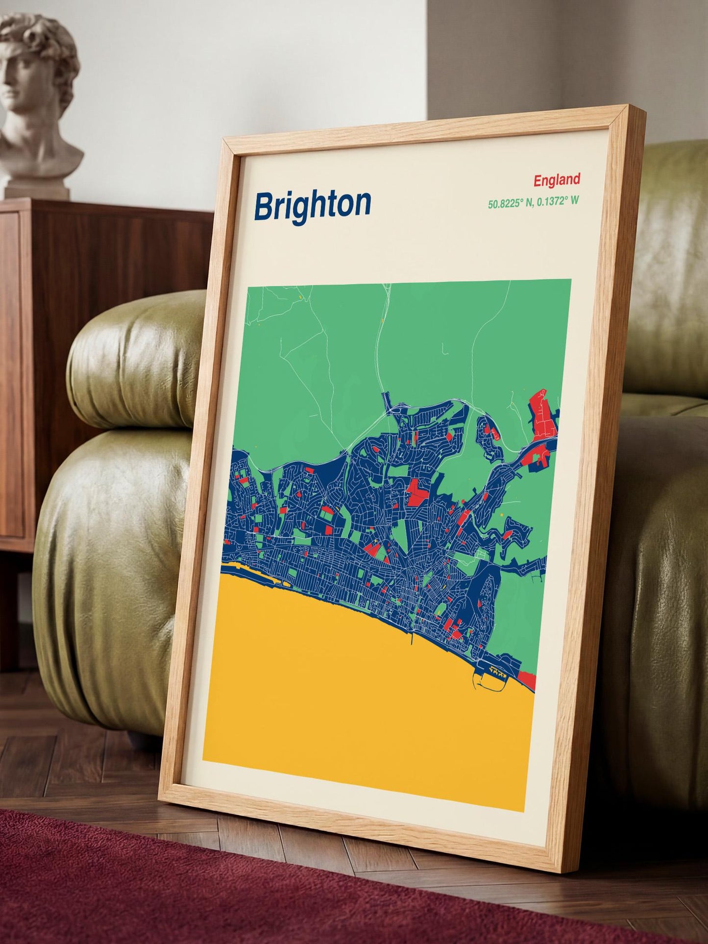 A framed map of Brighton, England, depicting the city's layout and surrounding areas.