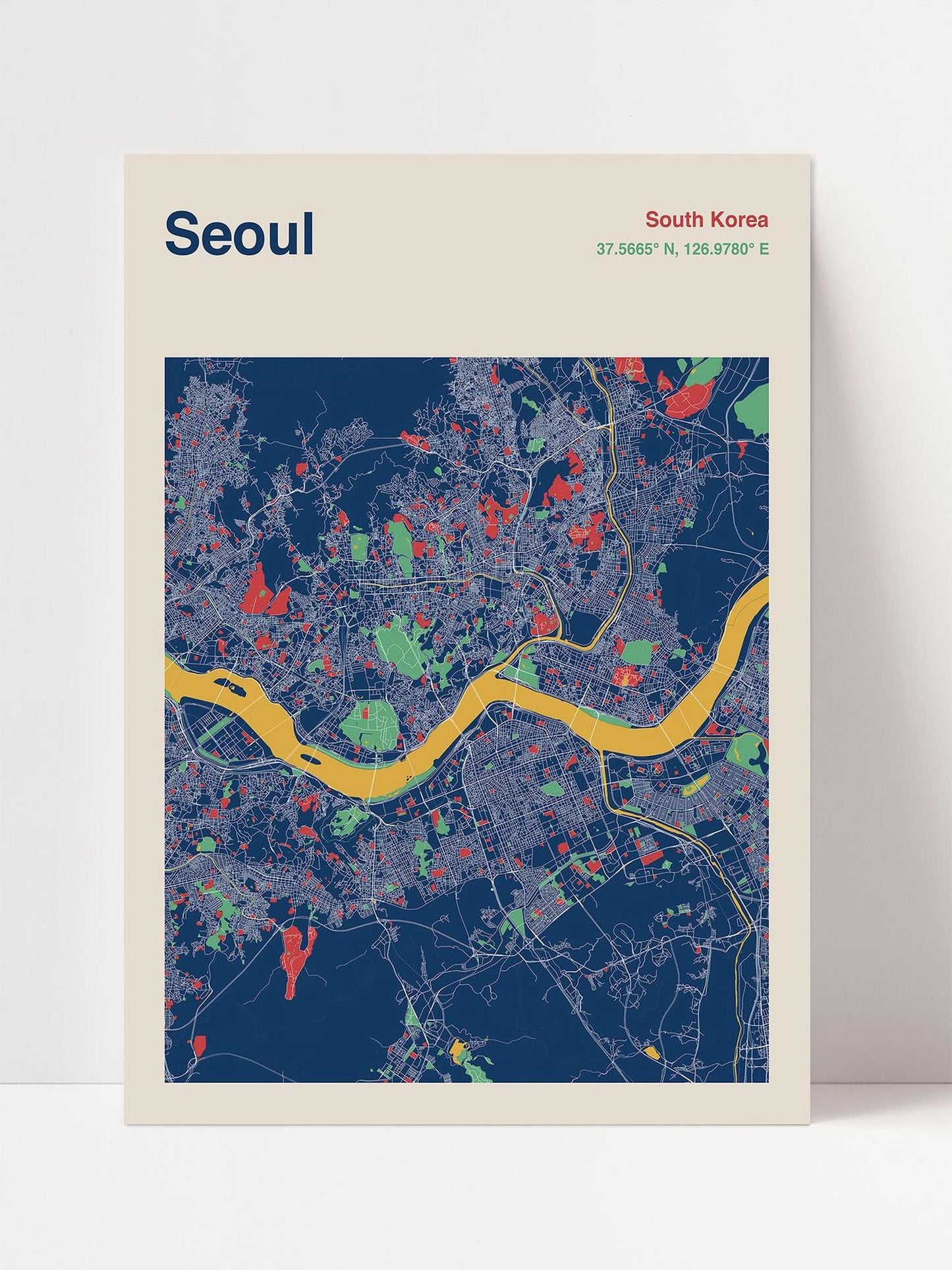 The image is a colorful map of Seoul, South Korea, depicting the city's streets, landmarks, and other features in a stylized and vibrant manner.