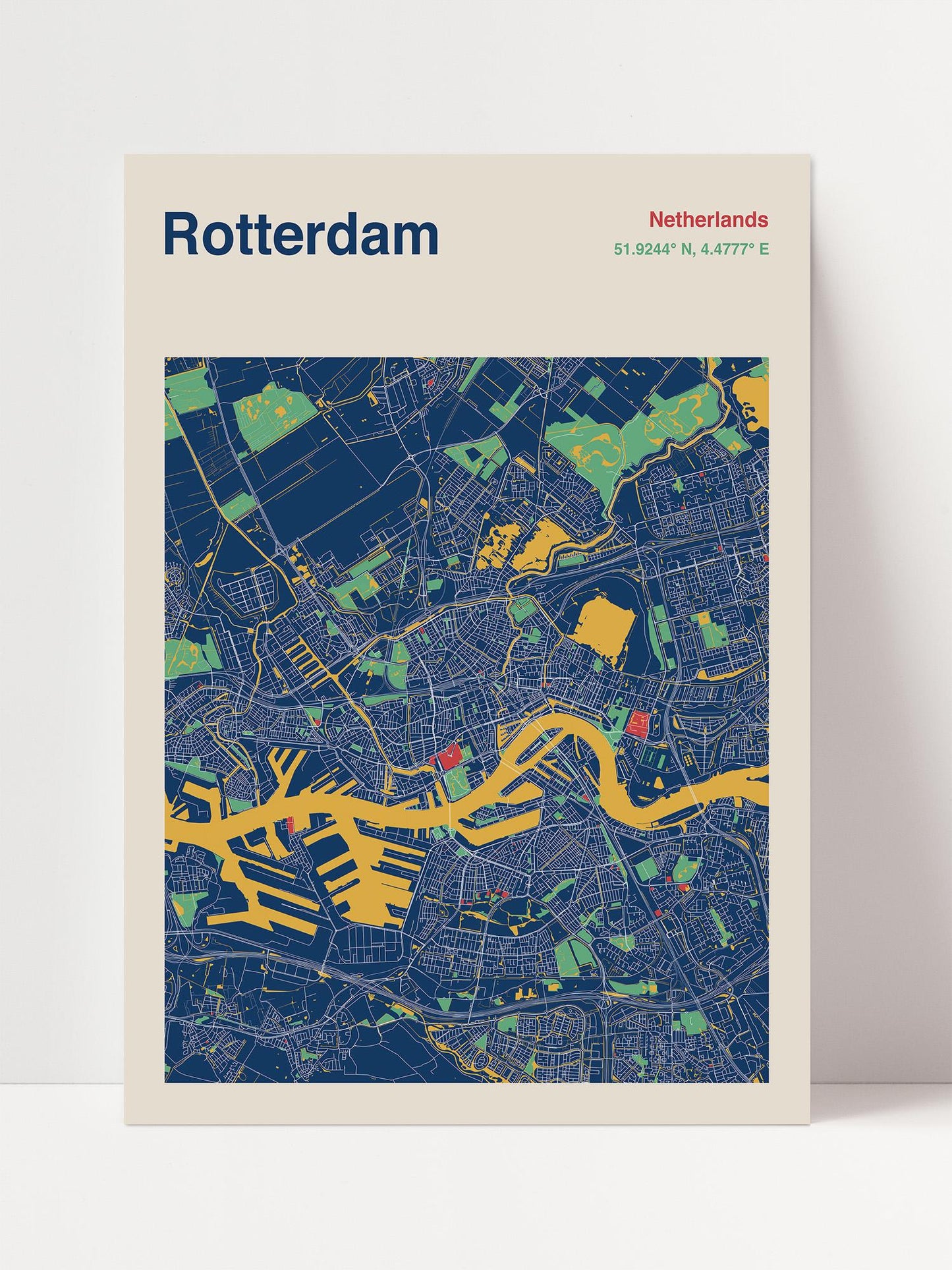 The image is a colorful map of Rotterdam, Netherlands, depicting the city's streets, parks, and other urban features in a stylized manner.