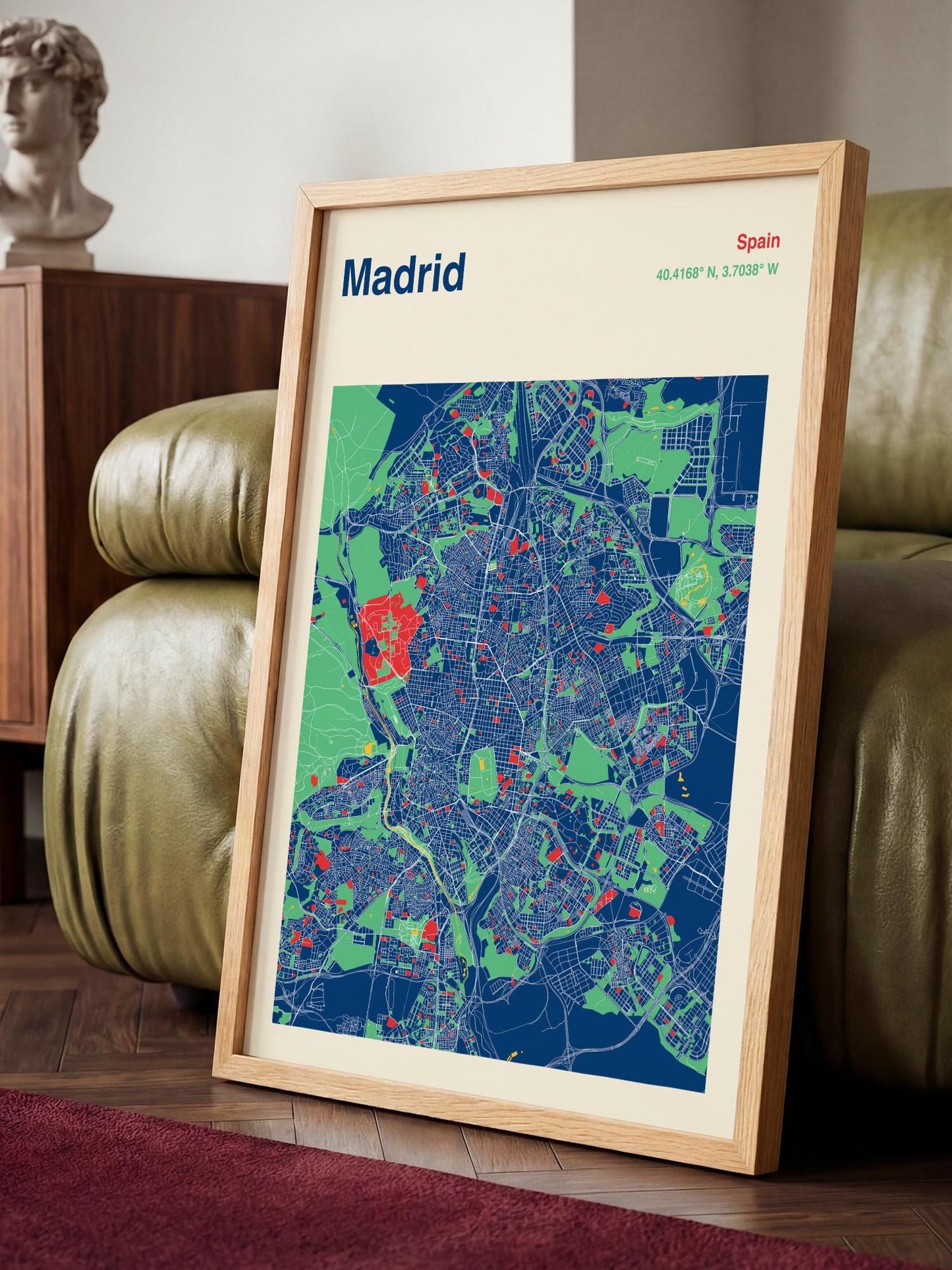 A framed map of Madrid, Spain, with a colorful and detailed representation of the city's streets and landmarks.