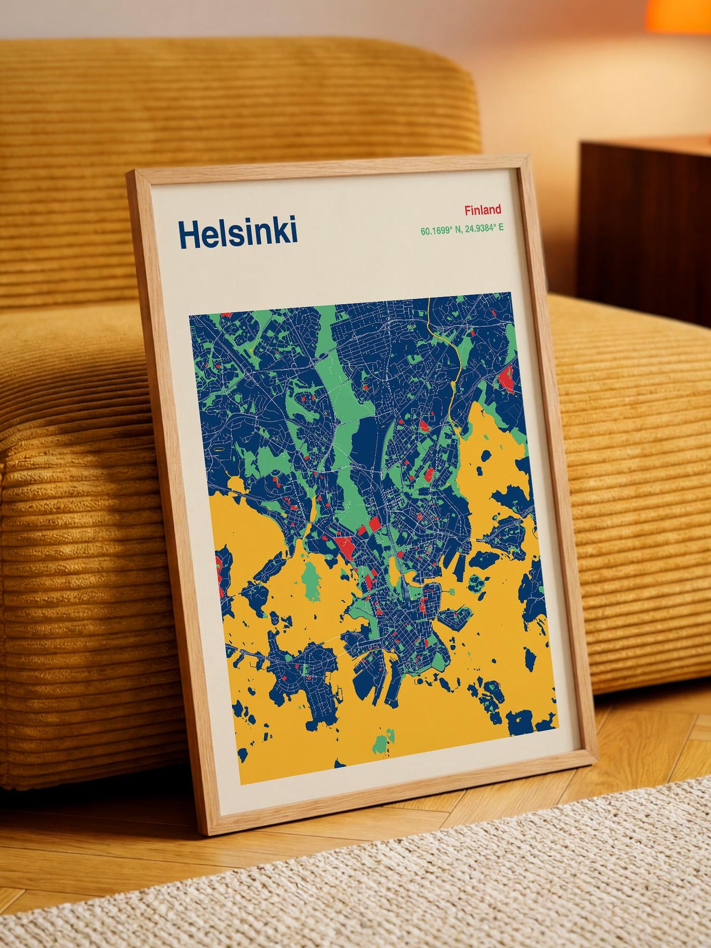 A framed map of Helsinki, Finland, with a colorful and detailed representation of the city's streets and landmarks.
